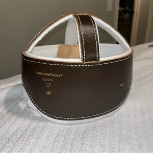 Sammons Preston Brown and White helmet Headgear